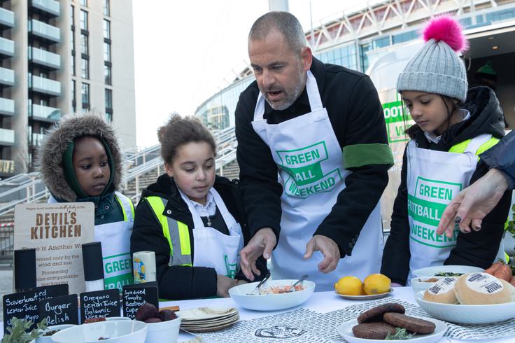 Joe Cole and local school children take part in the Green Football Weekend Ready Veggie Cook Off Challenge